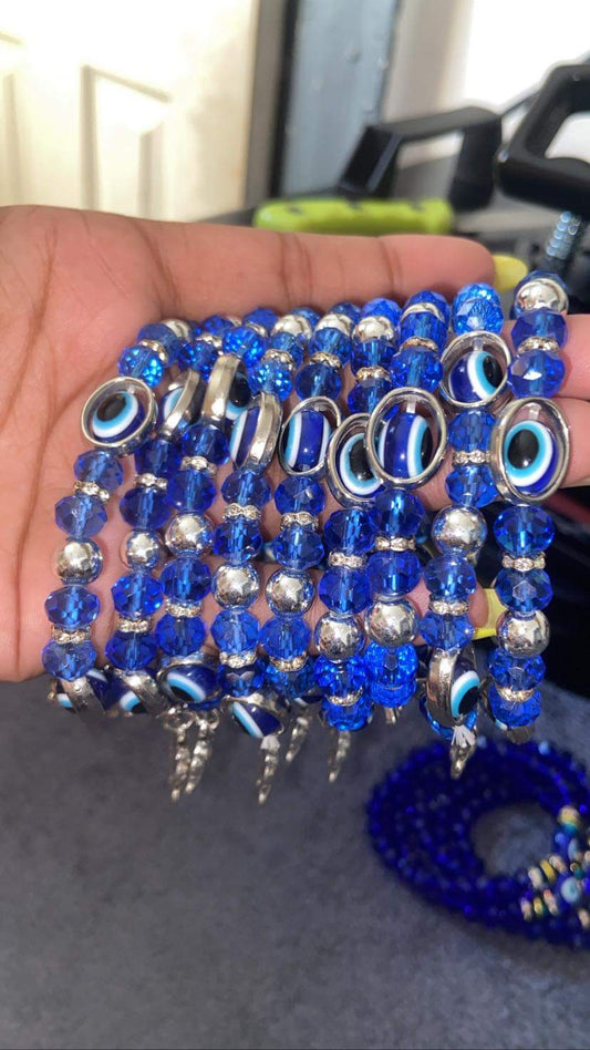 Evil eye with charms
